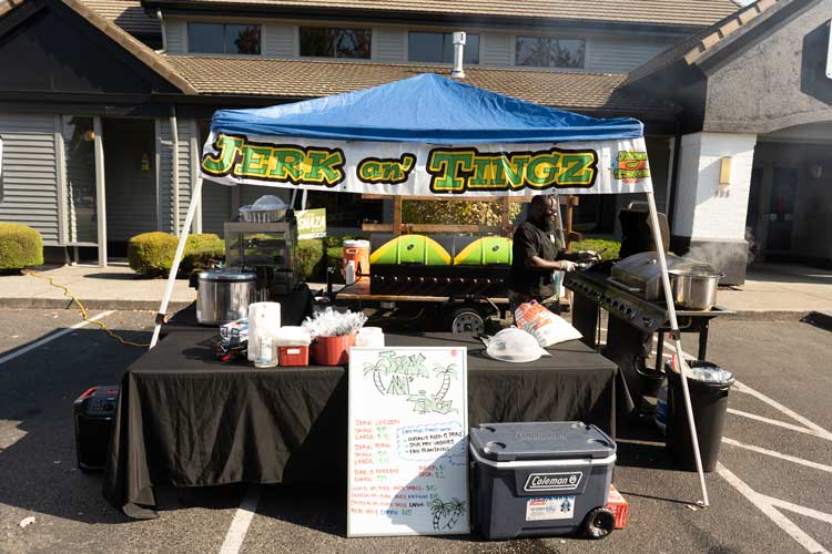 jerk an tingz jamiacan restaurant pop up tent outisde of 507 taproom in yelm washington